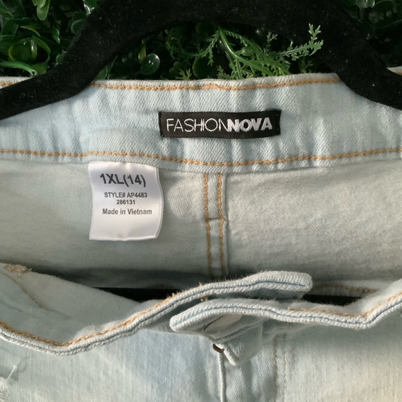 Fashion Nova Ripped Light Blue Skinny Jeans - Picture 3 of 4